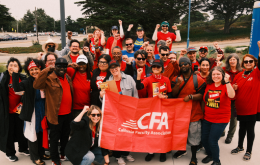A large group of people in CFA shirts with a red cfa flag