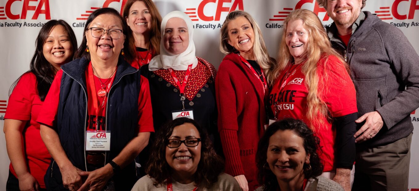 a group of people pose for a picture