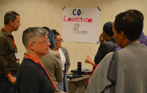 CFA members breakout into groups during an Equity Conference session.