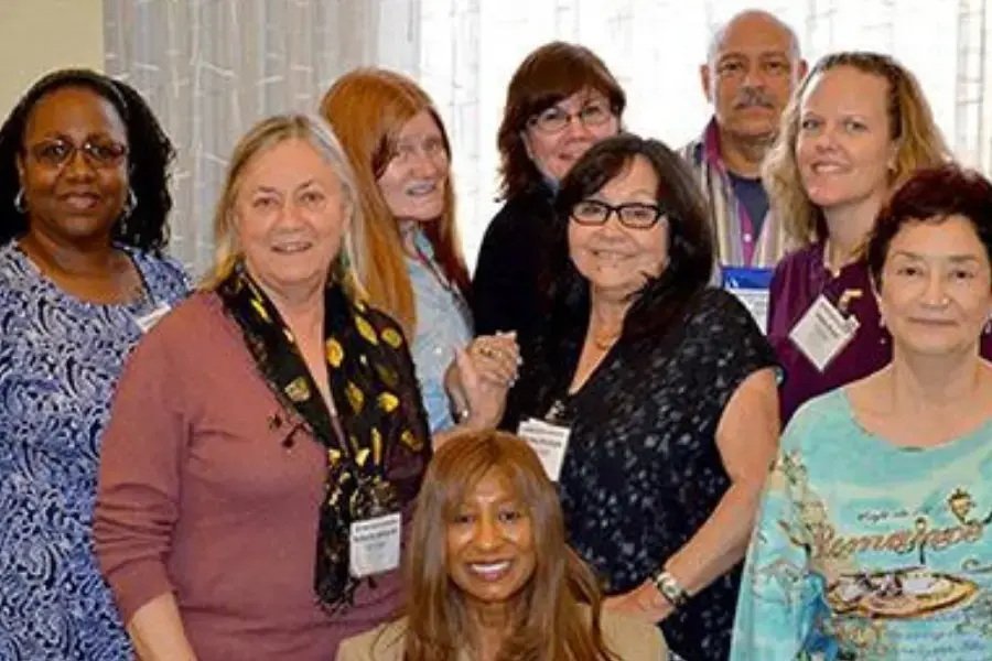 Teacher Ed Caucus members pose for a picture.