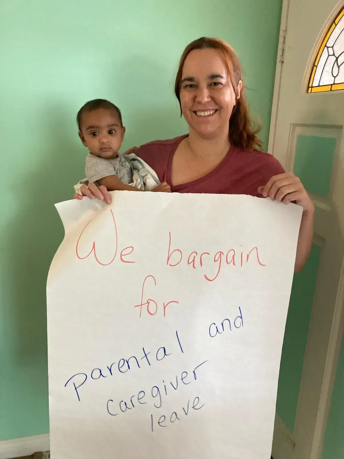 CFA member pose with child