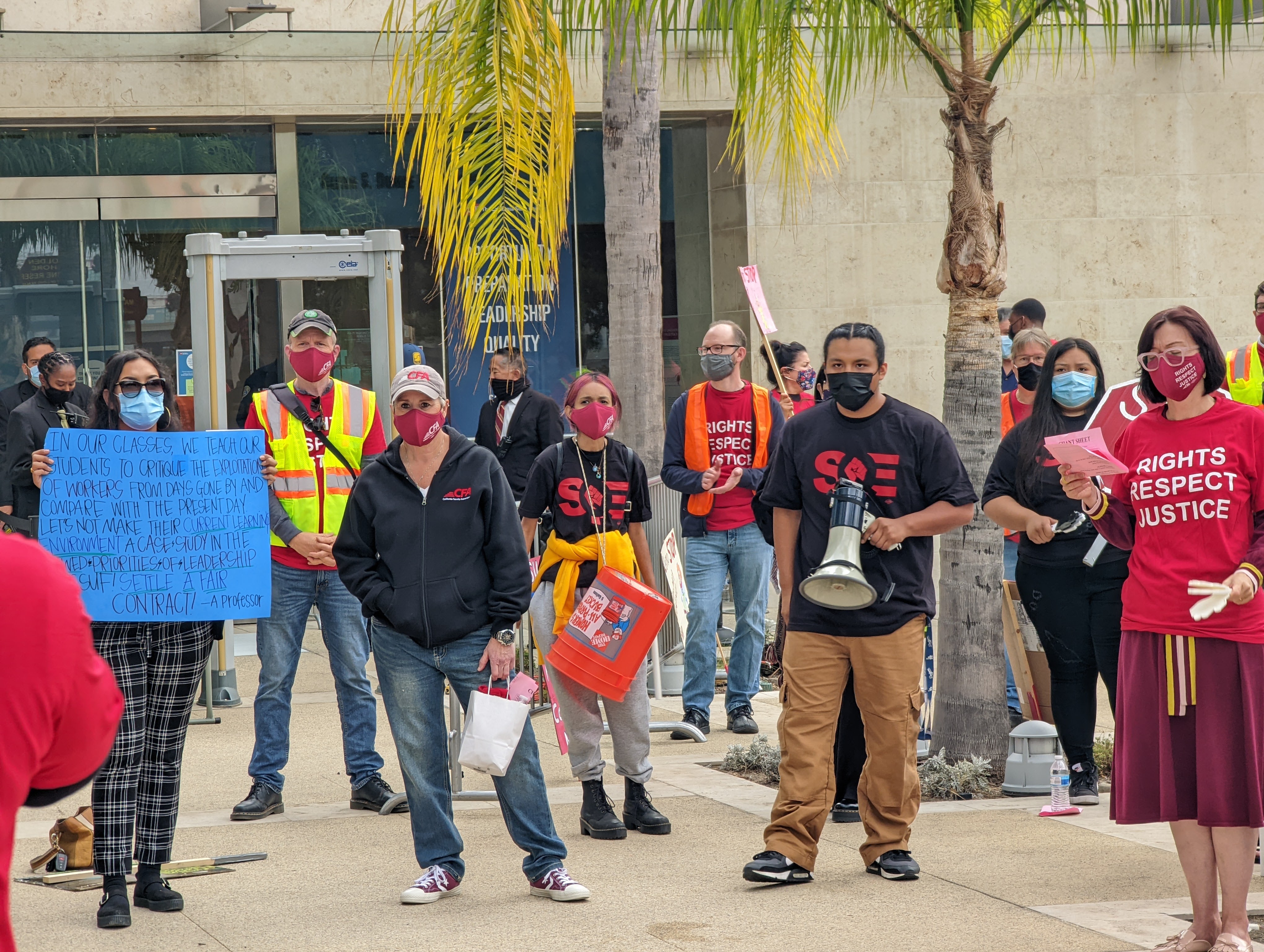 A group of people standing outside