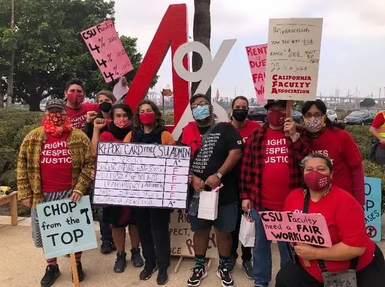 CFA LA members pose as a group with their rally signs.