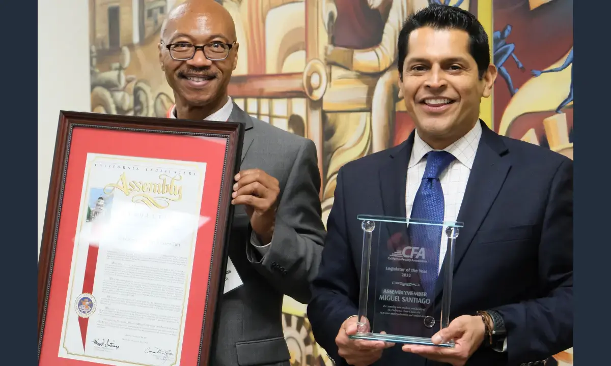Charles Toombs, CFA President, poses with CFA Legislator of the Year, Asm. Miguel Santiago (D-Los Angeles). Santiago presented Toombs and CFA with a California Assembly Resolution recognizing the decades of work of our faculty members and union. 