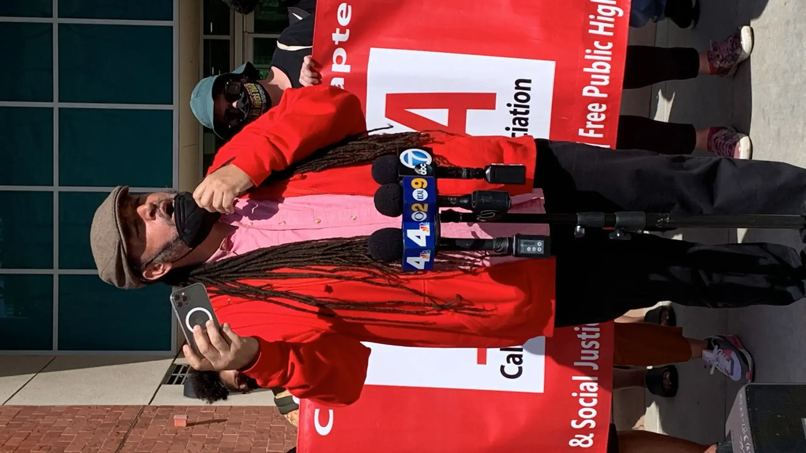 Man speaking at a press conference