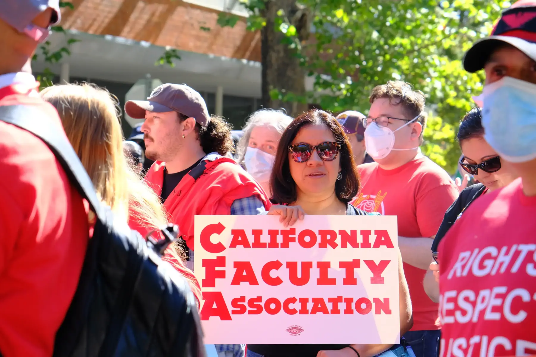 Woman holding a sign