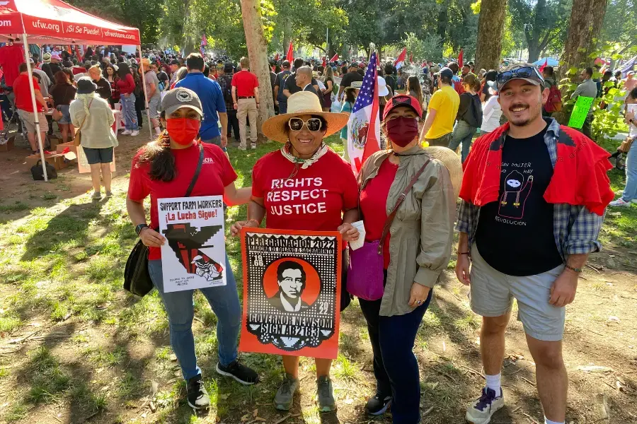 A group of CFA members with posters at the Farmworkers march.