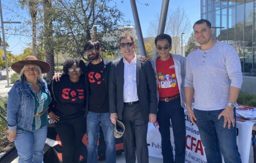 Student interns and CFA members pose for a picture during an SQE tabling event