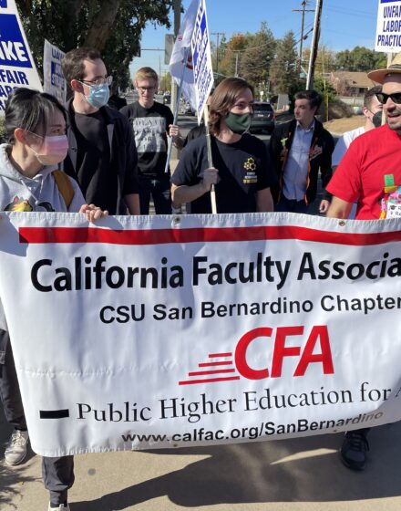 CFA members walk with UAW members on strike