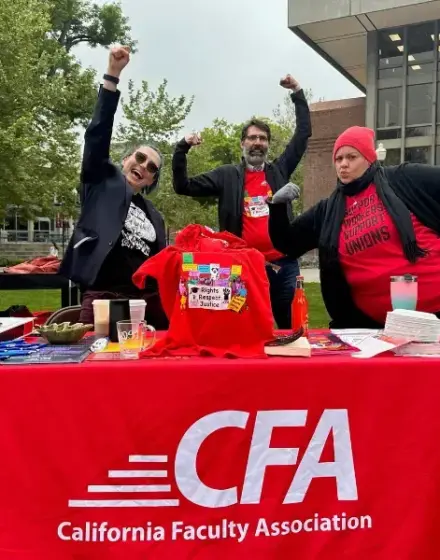 Three CFA members in red tshirts outside