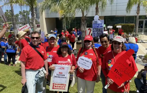A group of five, wearing red CFA shirts pose for a picture.