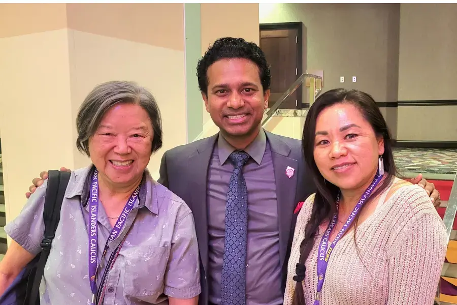 Two CFA members pose for a photo at the API SEIU Summit.