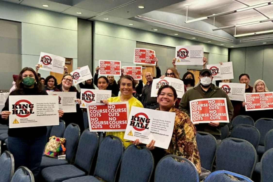 CFA members holding signs.