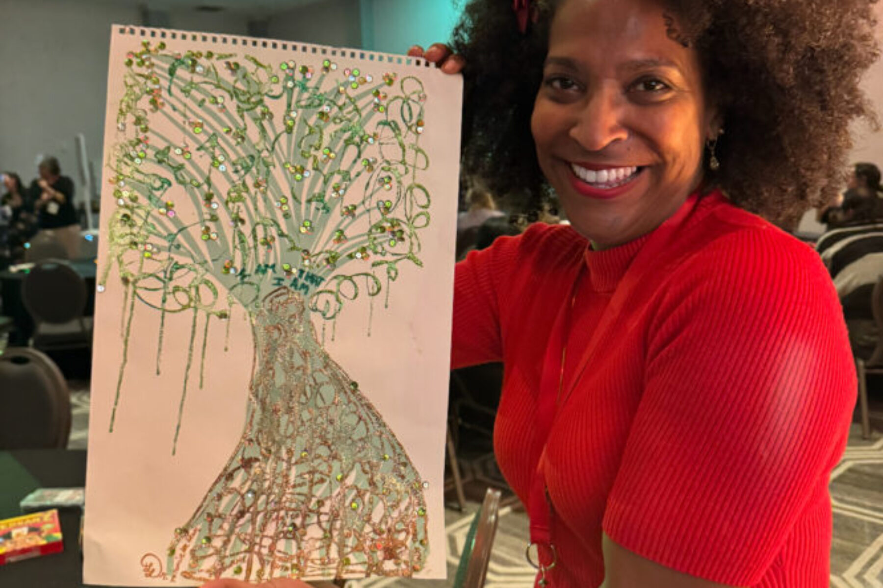 person holding tree picture