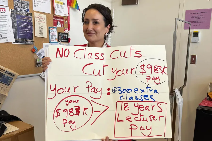 Woman holding a poster