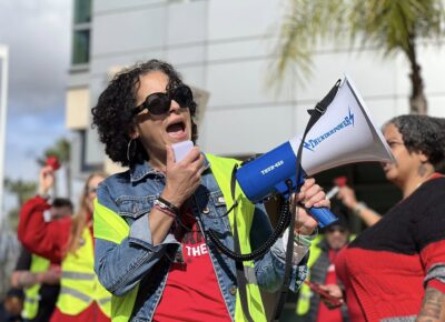 CFA VP with a megaphone rallies up members