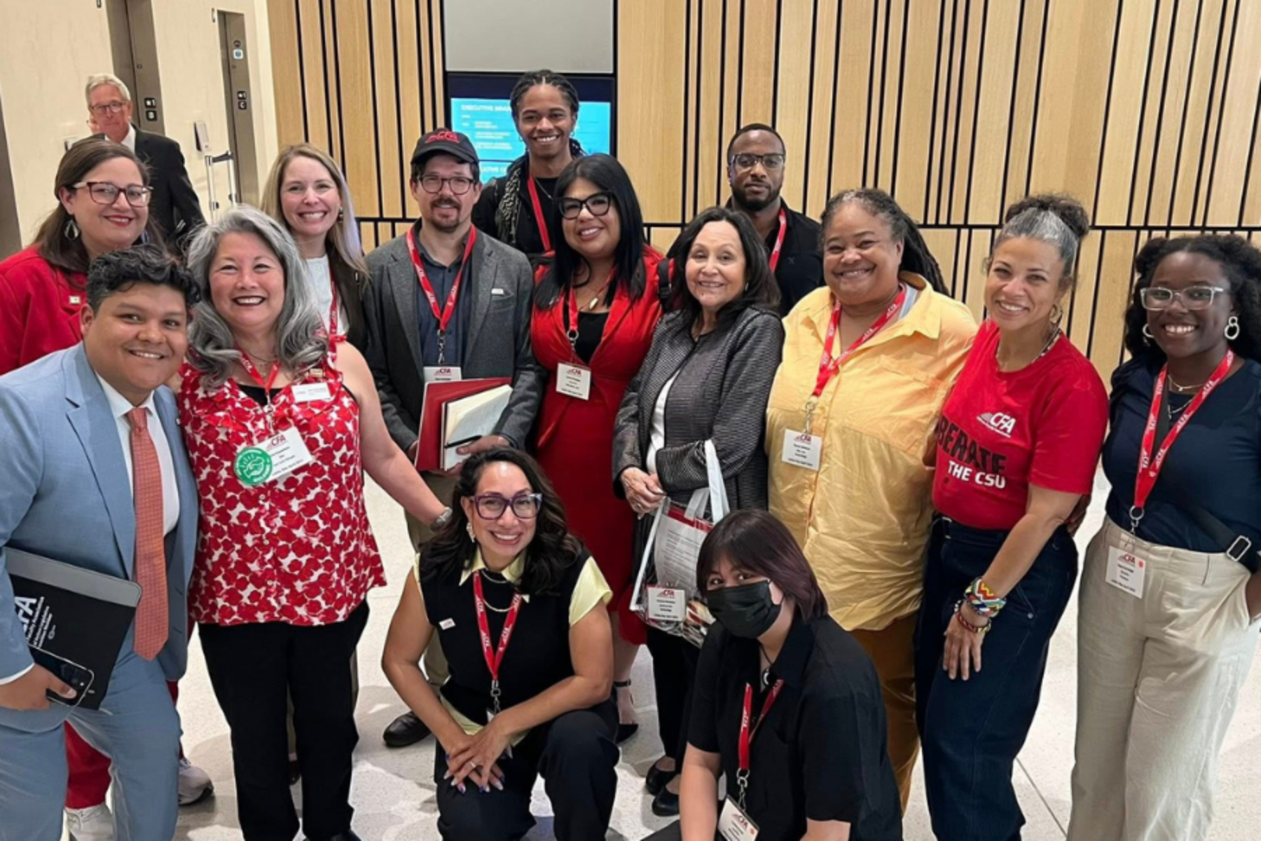 A group faculty and staff members inside a building