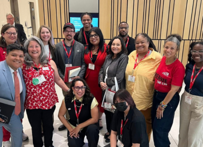 A group faculty and staff members inside a building
