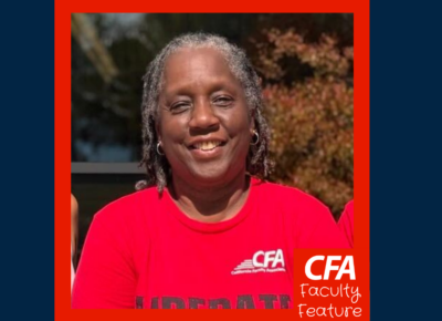 Woman in a red shirt smiling