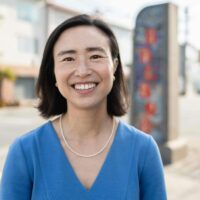 candidate in blue shirt and pearls