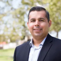 candidate in blue shirt and jacket