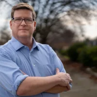 candidate in blue shirt