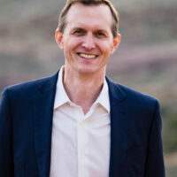 candidate in blue suit jacket
