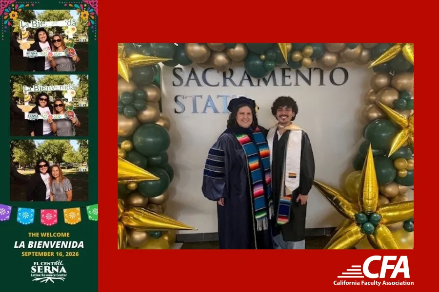 Two graduates in caps and gowns smile in front of a Sacramento State backdrop decorated with gold and green balloons.