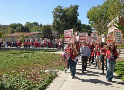 A group of people marching together.